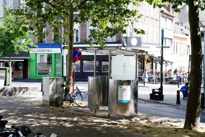 A public street scene in Ghent, Belgium, hinting at the public defecation issue