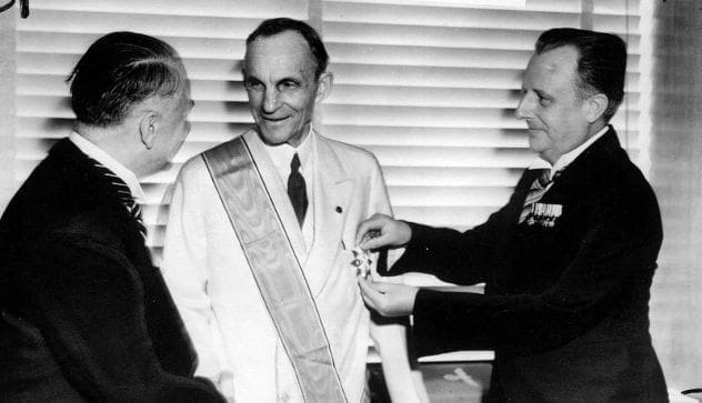 Henry Ford receiving the Grand Cross of the German Eagle from Nazi officials