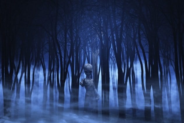 Soldier encountering a glowing figure near a military base