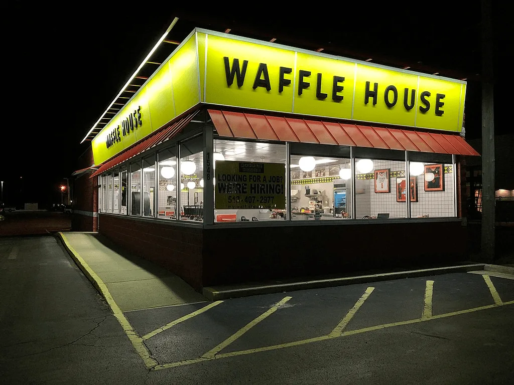 Exterior of a Waffle House restaurant during the day