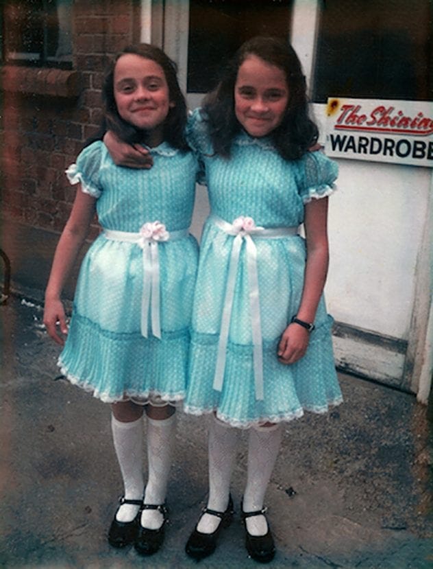 The Shining twins smiling
