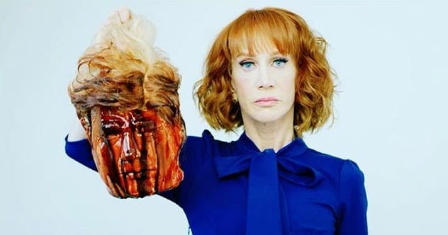 Kathy Griffin holding a controversial mask