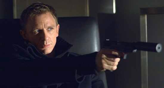 James Bond facing a villain, likely to hear the villain's entire plan cliché