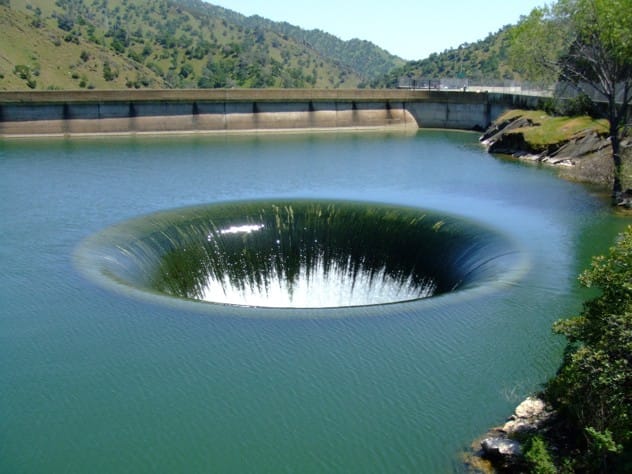 The Morning Glory Spillway, a large circular hole draining water from Lake Berryessa.