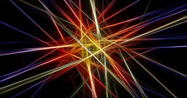 laser lights shining on a house