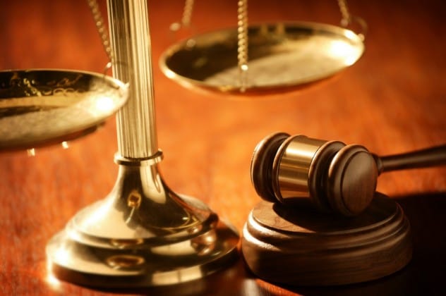 Gavel and law book, symbolizing the illegality of moonshine