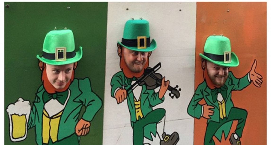Man stuck in leprechaun photo stand
