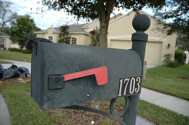 Mailbox with letters sticking out