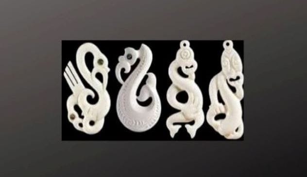 Maori manaia carving showing a stylized figure