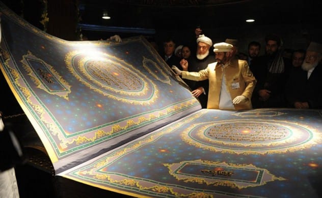 A very large, open Quran on display