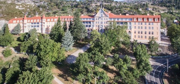 Stone exterior of the historic Pousada Serra da Estrela hotel in Portugal