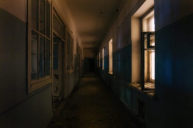 Ghost figure in a school hallway