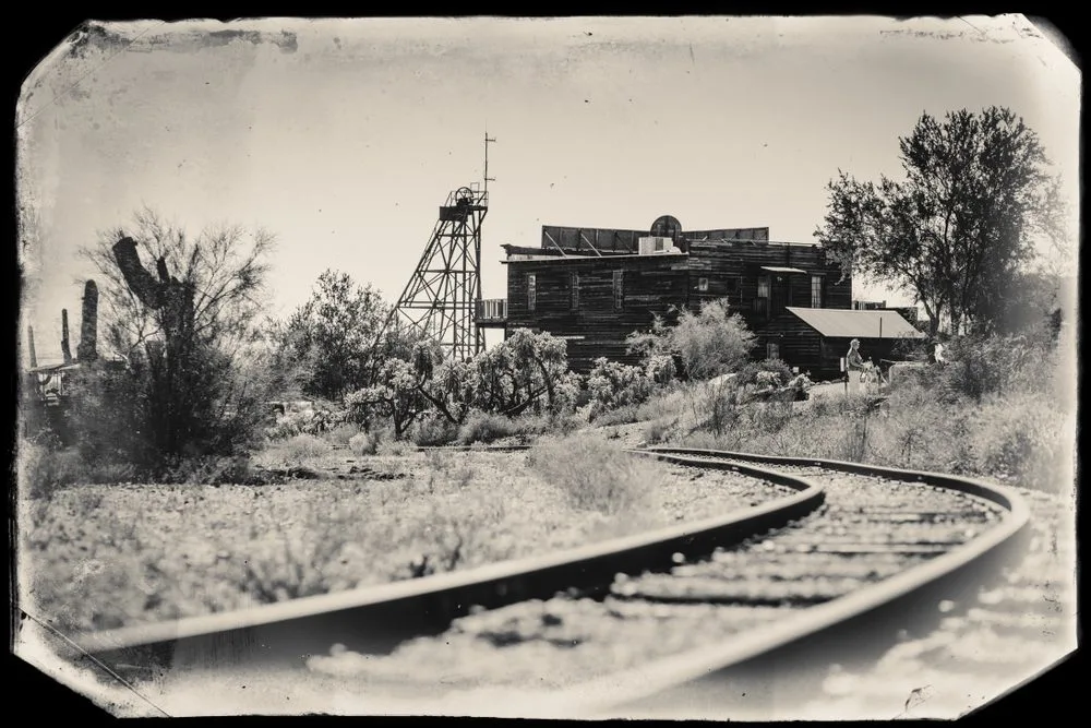 A ghostly steam train in a snowy mountain pass