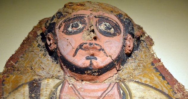 Fayum mummy portrait of a woman with realistic facial features