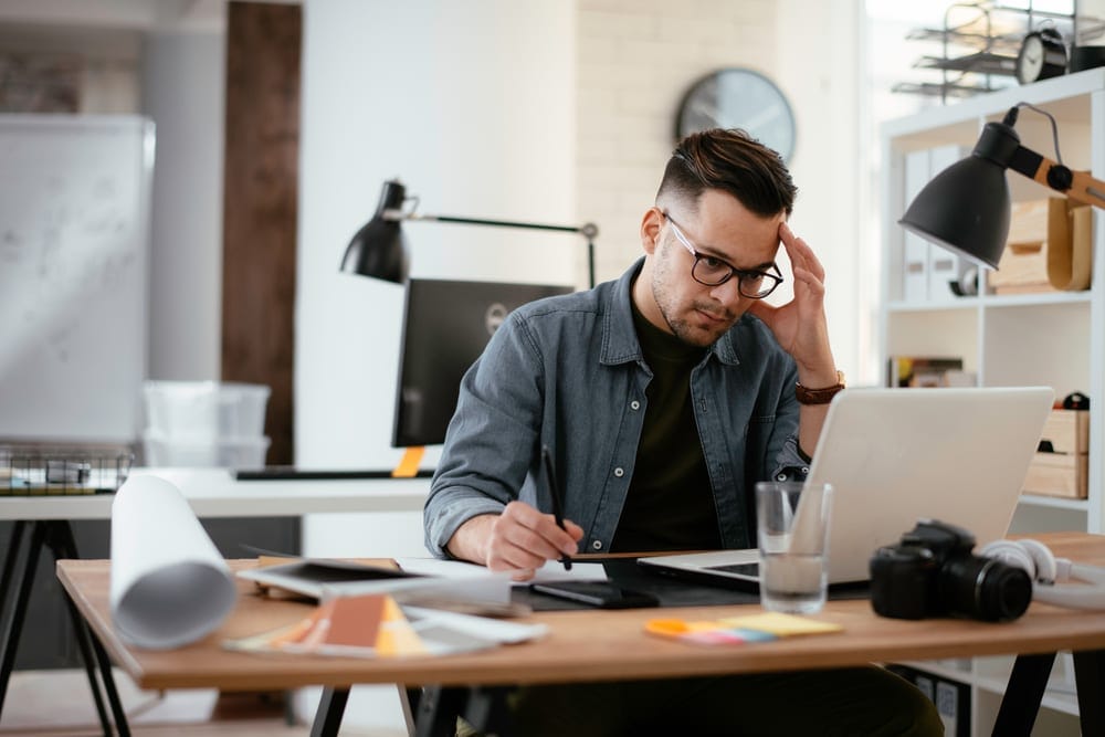Person working on a laptop from home