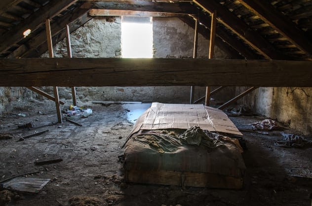 Messy attic with personal belongings