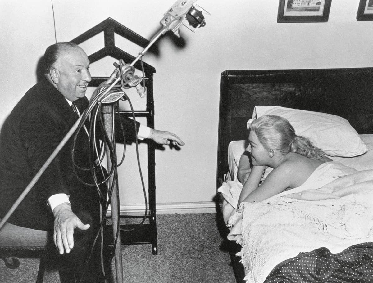 Alfred Hitchcock with Kim Novak on set