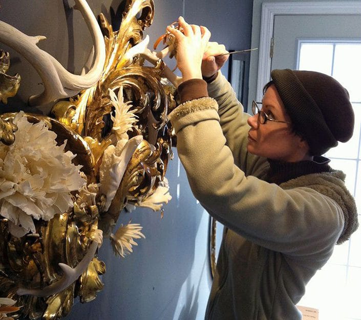Intricate baroque-style artwork made from animal antlers and bones by Jennifer Trask