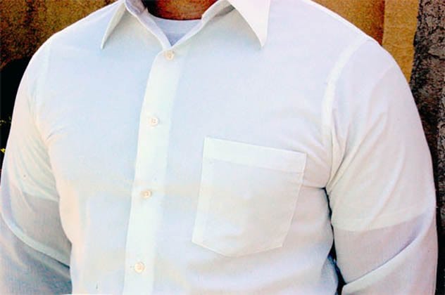 Example of an undershirt incorrectly visible at the collar