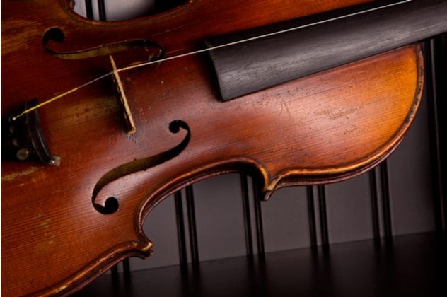 A violin, symbolizing Charles Peace's musical talent as 'The Modern Paganini'.