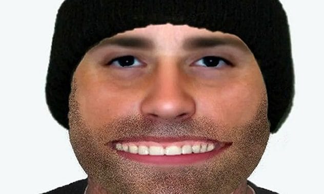 E-FIT sketch of a suspect with an unusually large, smiling mouth.